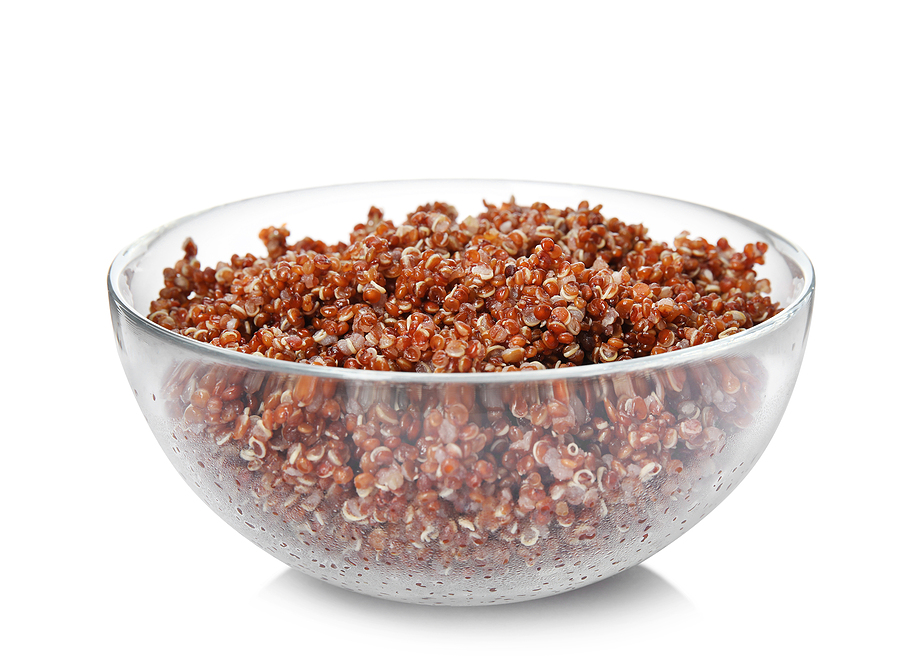 View of cooked red quinoa isolated on white