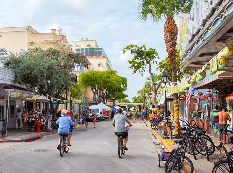 Key West, Florida, United States - November 2, 2018: Street view of the Main Strip in the Downtown City where all the bars are located.