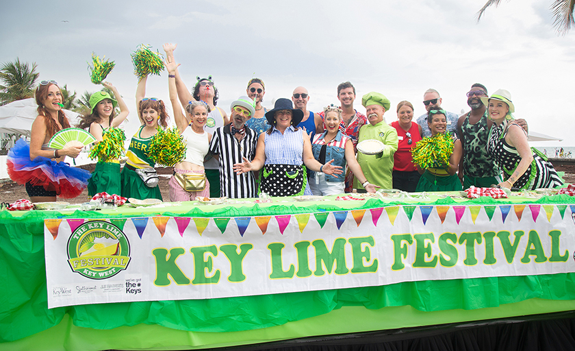 Nadene Grossman Orr, Key Lime Festival Director and President/CEO of We’ve Got the Keys, center, and Key Lime pie icon Kermit Carpenter, holding pie, pose with Festival team members and Southernmost Beach Resort staff following the July 4, 2025, World Famous Key Lime Pie Eating Championship in Key West, Fla. An annual event that celebrates the “world’s most sensational citrus,” the Key Lime Festival continues at multiple venues around the island through July 6. (Carol Tedesco/KeyLimeFestival.com)
